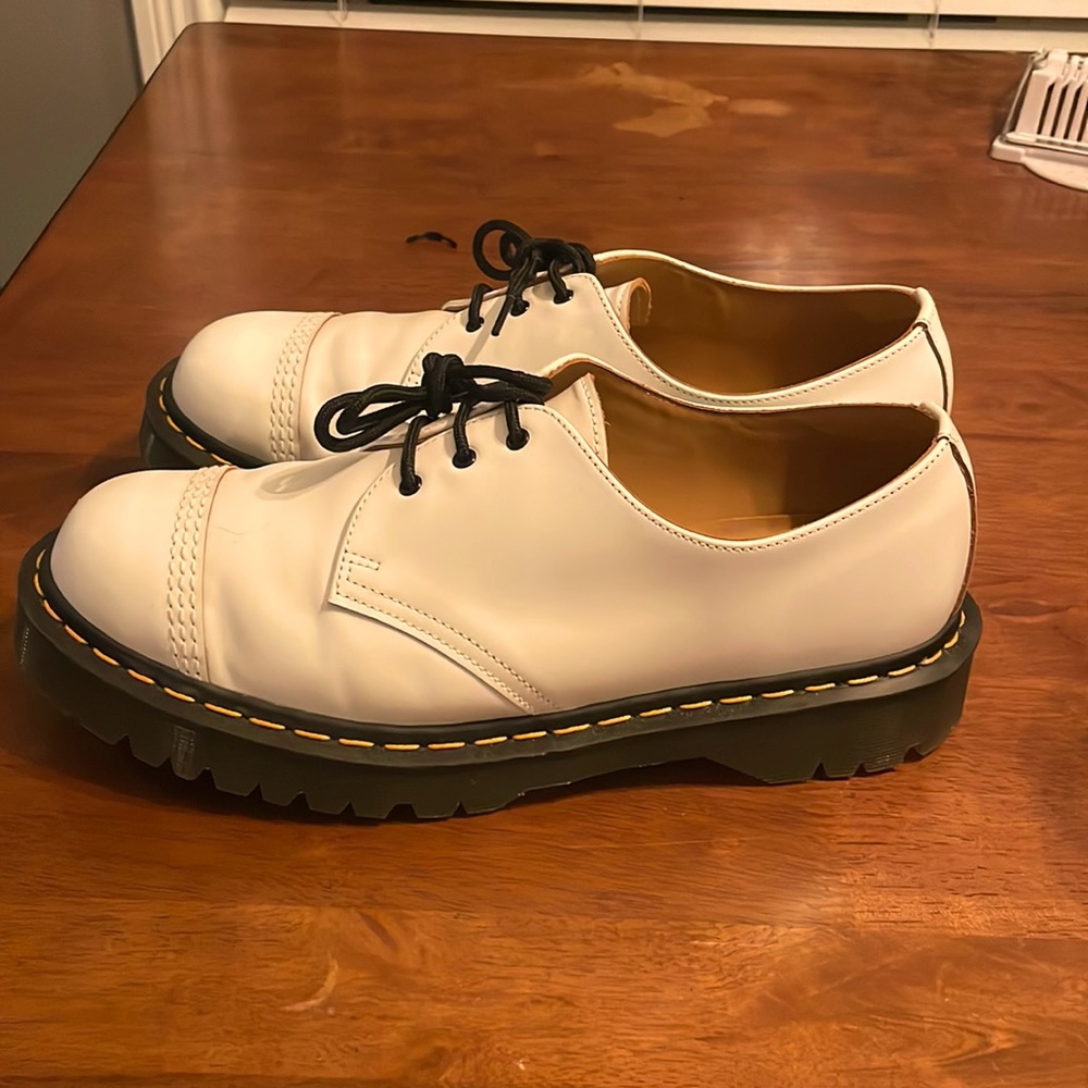 Dr. Martens made in England. Size 12 Men’s. One light scuff. Come with a Box+Bag